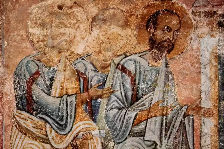 Apostles Communion scene detail showing two apostolic figures with golden halos against salmon-pink background
