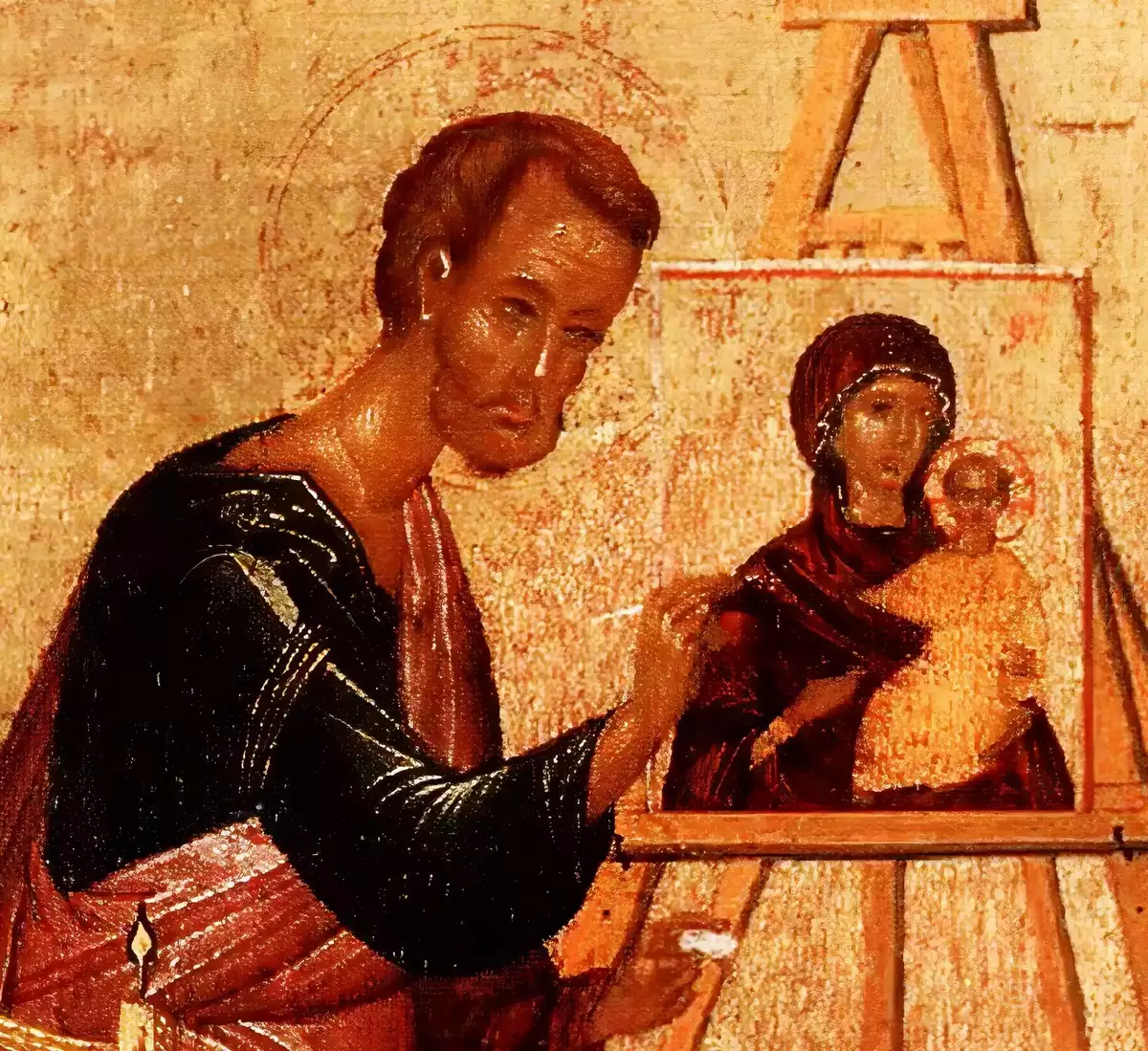 Detail showing Saint Luke's contemplative face in three-quarter view from a 16th century Byzantine icon depicting him painting the Virgin Hodegetria