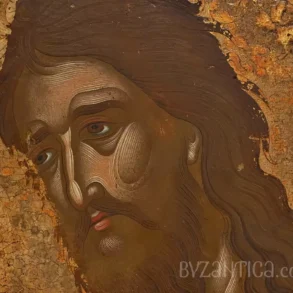 Detailed close-up of Saint John Baptist in Princeton icon showing the saint's intense expression against golden background