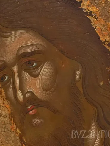 Detailed close-up of Saint John Baptist in Princeton icon showing the saint's intense expression against golden background
