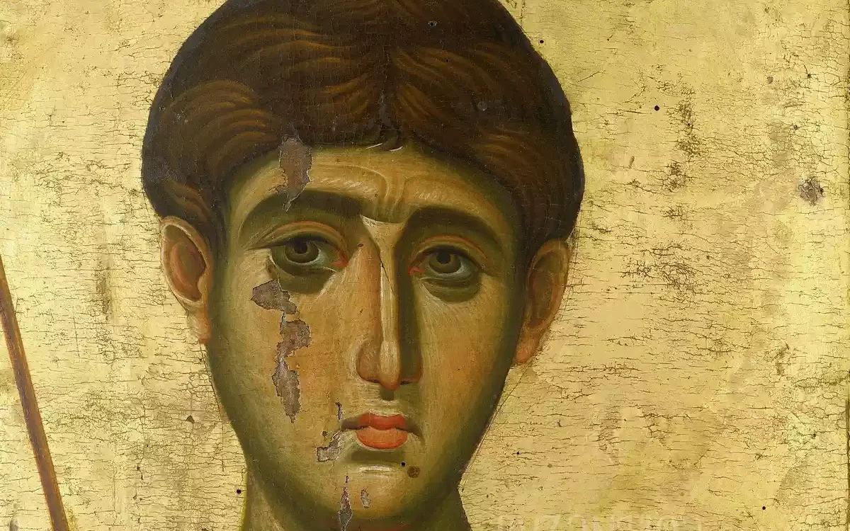 Detailed view of Saint Demetrios in Vatopedi icon showing the saint's face against golden background with expert brushwork