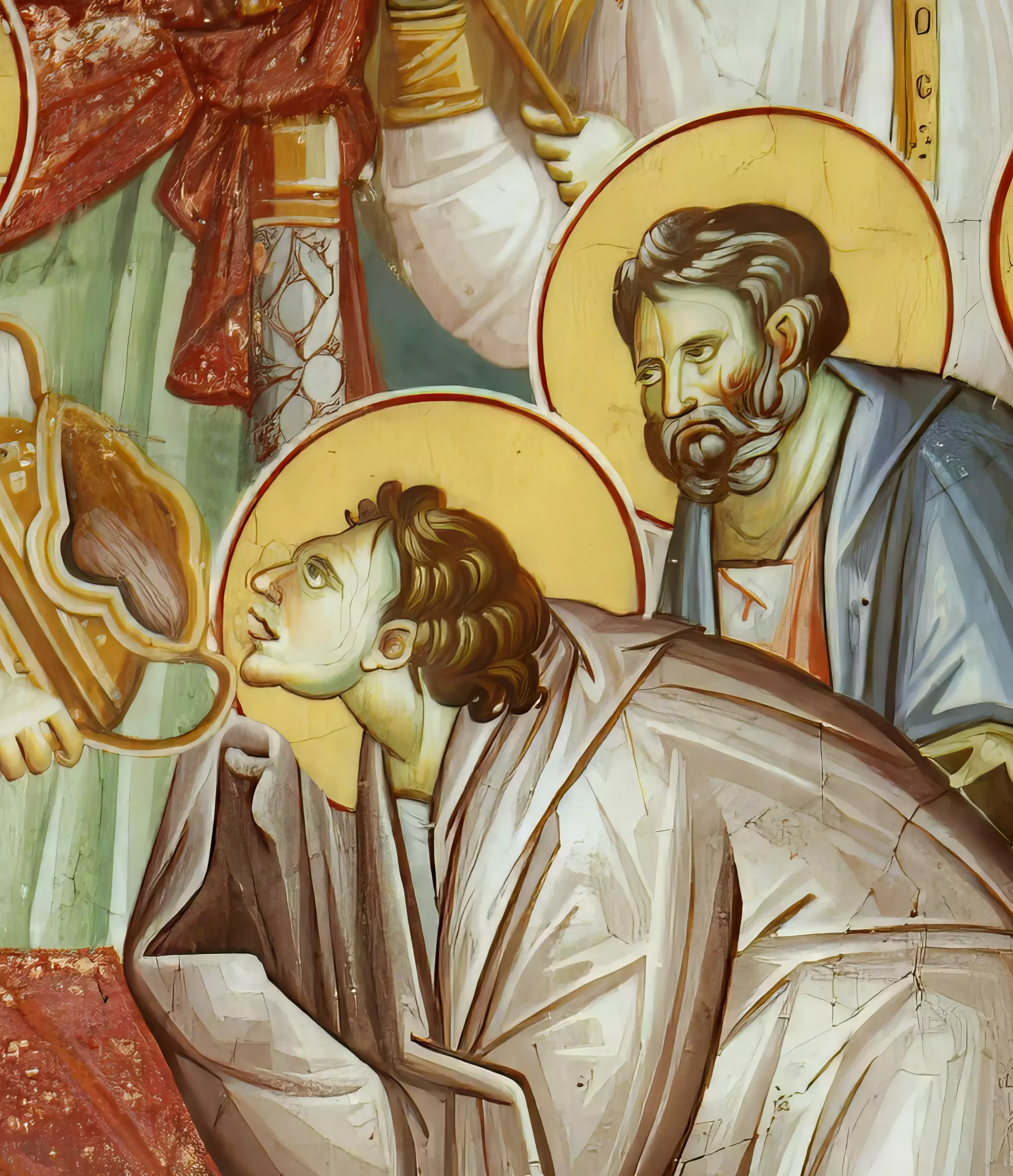 Detail of two saints receiving communion, with golden halos and rich drapery, from the 14th century Divine Liturgy fresco in Ohrid's Church of Theotokos Peribleptos