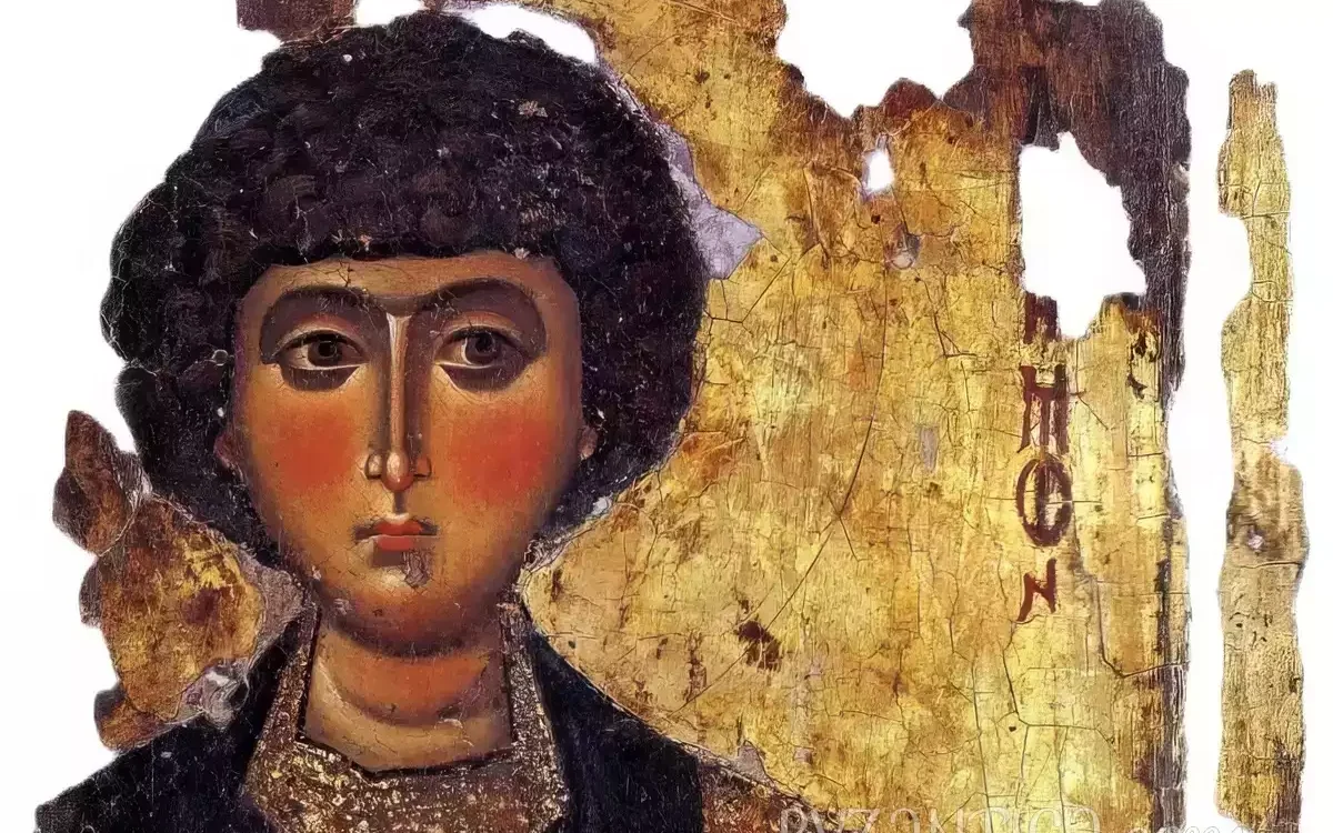 Detail of Saint Panteleimon icon in Megisti Lavra showing facial features against gold background, 12th-century Byzantine art